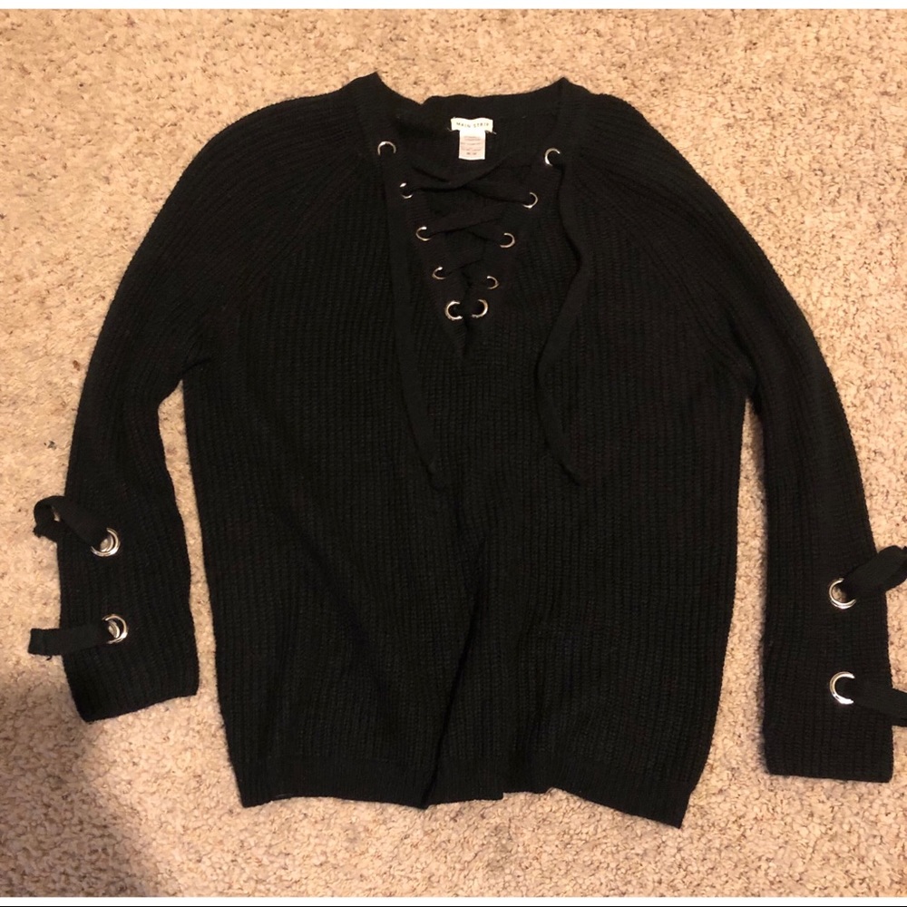 Knitted cross cross sweater